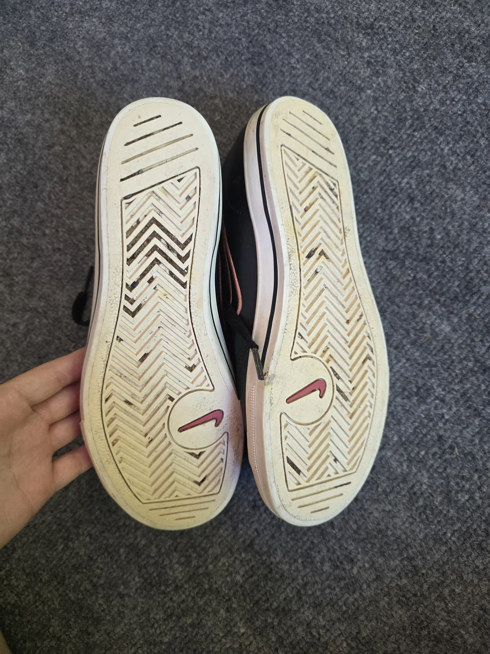 Nike Women's Black Sneakers with Pink Logo Accents